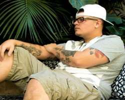 Codee has several tattoos on his arms. Tattoo on his right hand represents the dog's paw and writing in Roman.